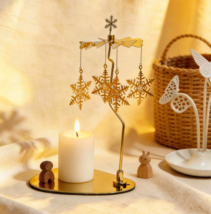 Snowflake spinning candle stand with warm cozy decor