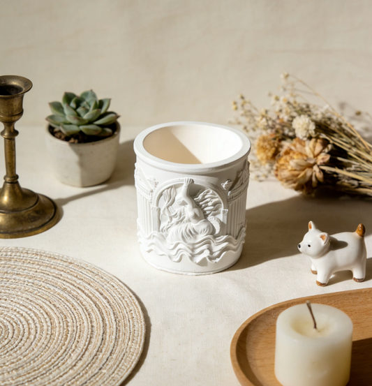 Mermaid candle jar styled with succulents and vintage decor