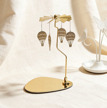 Gold rotary candle carousel with hot air balloon pendants