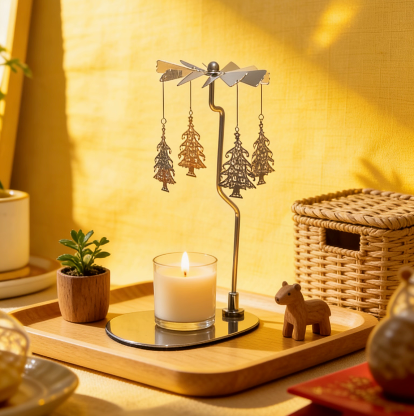 Christmas tree candle carousel with warm cozy home decor
