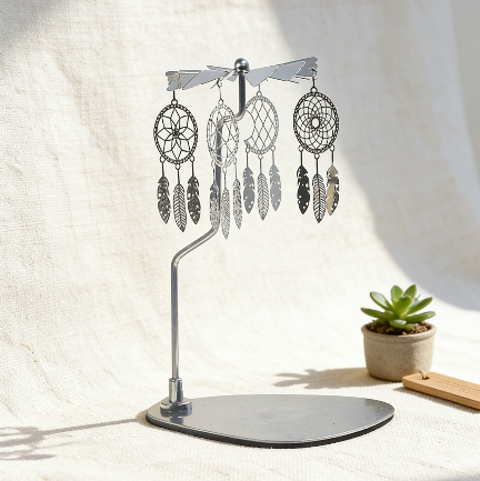Silver rotary candle carousel with dreamcatcher charms
