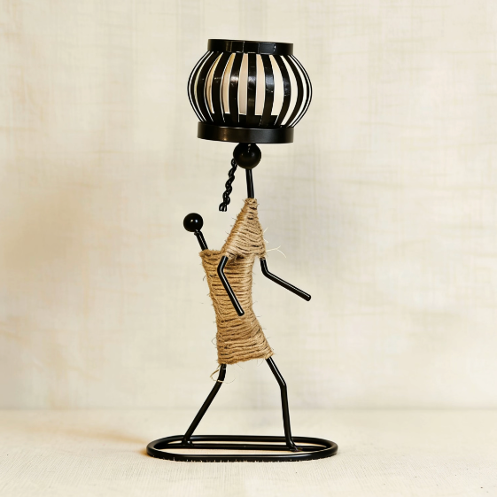 Standing abstract metal candle holder with lantern on head