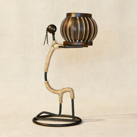 Vintage bronze finish metal candle holder, bent abstract figure