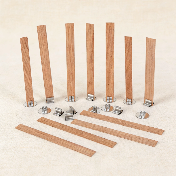 Wooden candle wicks with metal clips and metal bases, essential for candle making, providing a stable setup and clean burn for DIY candle projects