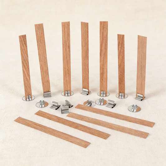 Wooden candle wicks with metal clips and metal bases, essential for candle making, providing a stable setup and clean burn for DIY candle projects