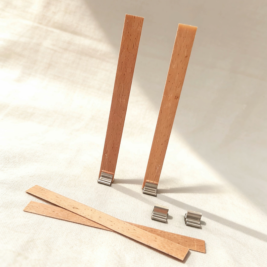 Wooden candle wicks with metal clips, essential for candle making, providing a clean burn and easy setup for DIY candle projects